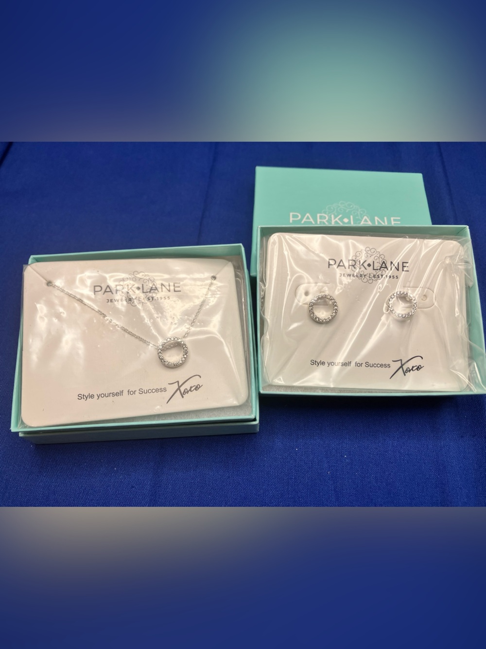 Park Lane Silver Crystal Circle Pendant Necklace with matching earrings